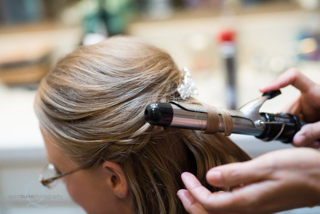 bride curling hair