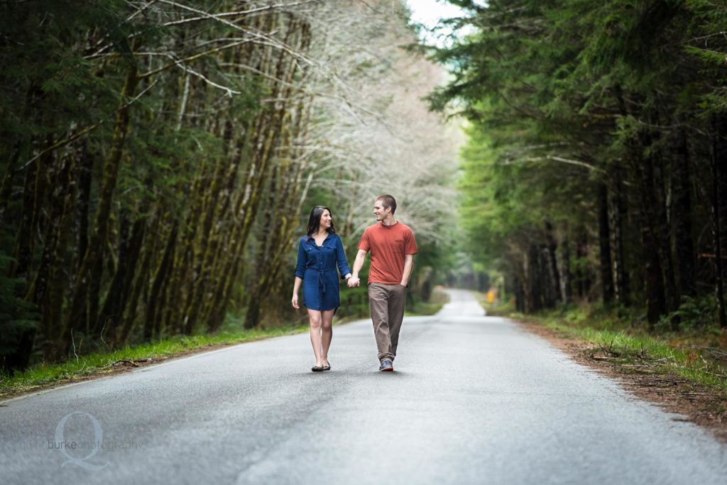 engaged couple walking road