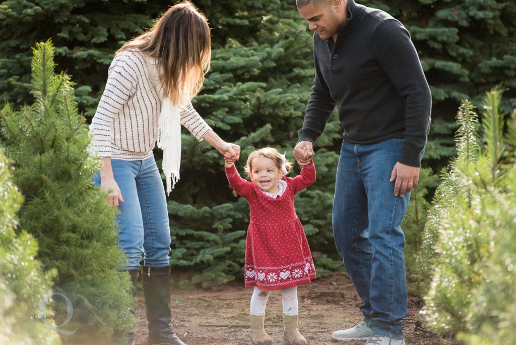 family at christmas tree farm