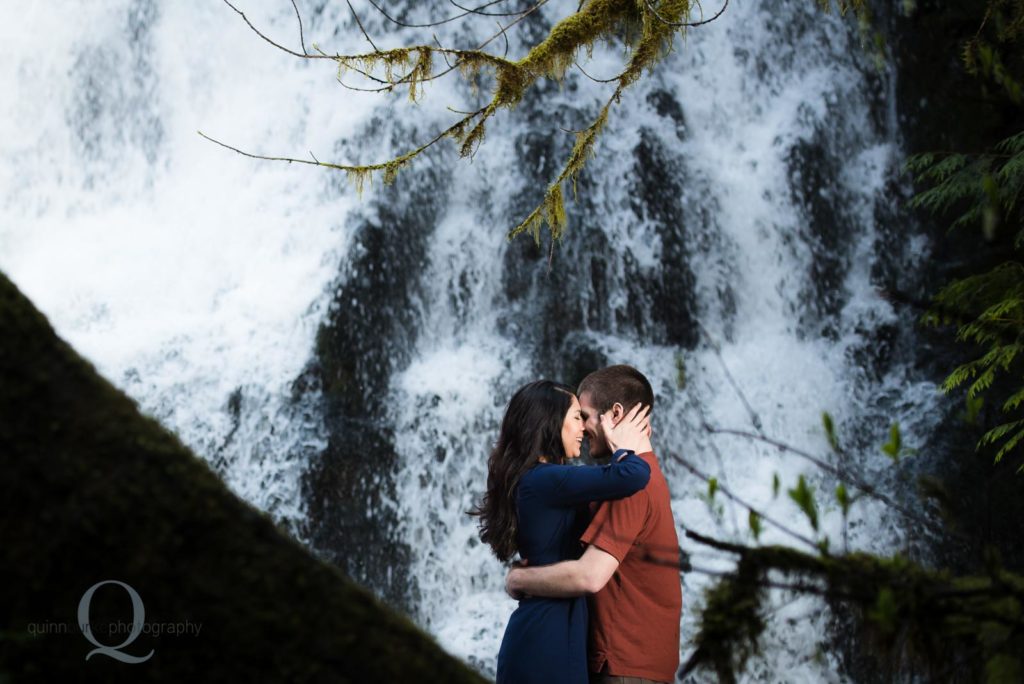 engagement photo in front of waterfall