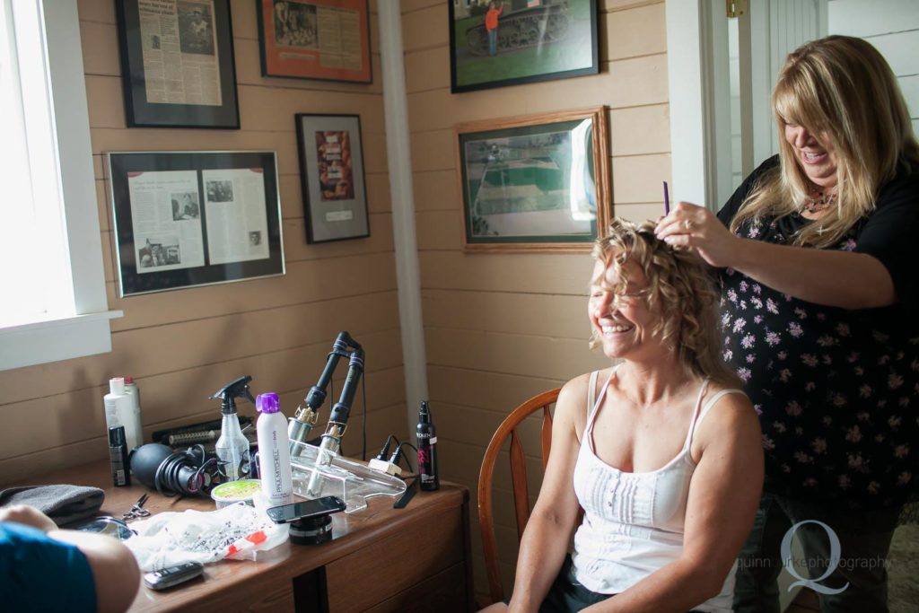 bride getting hair done