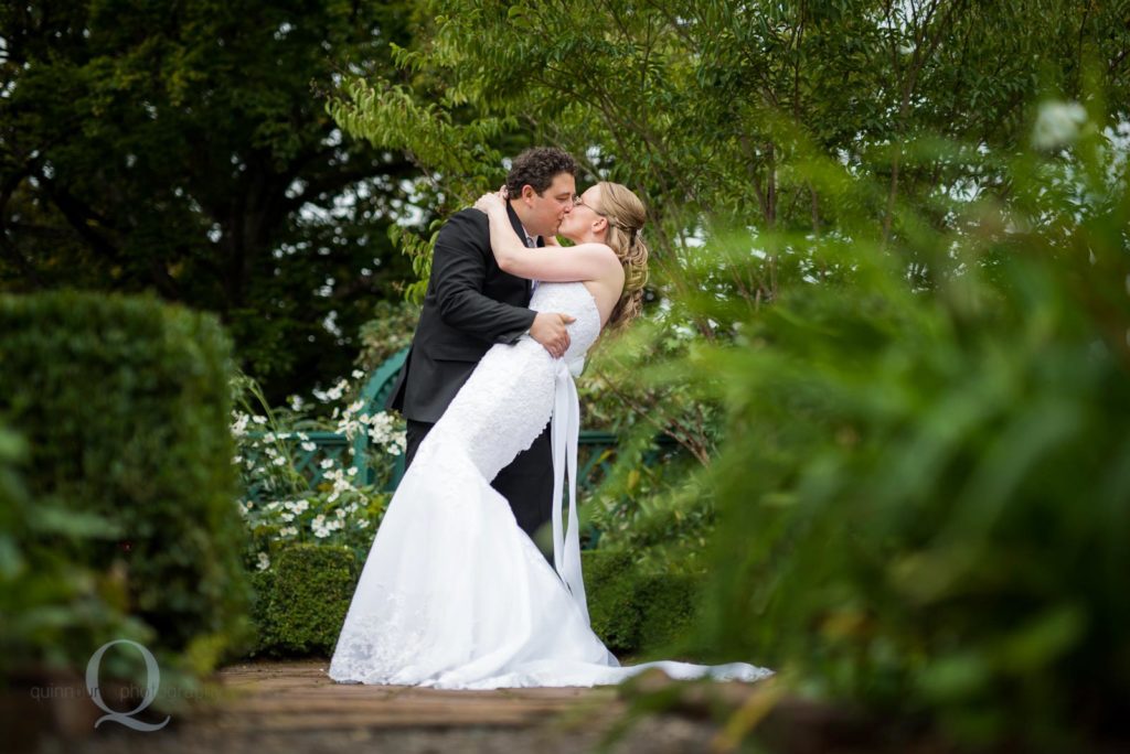 bride groom garden kiss