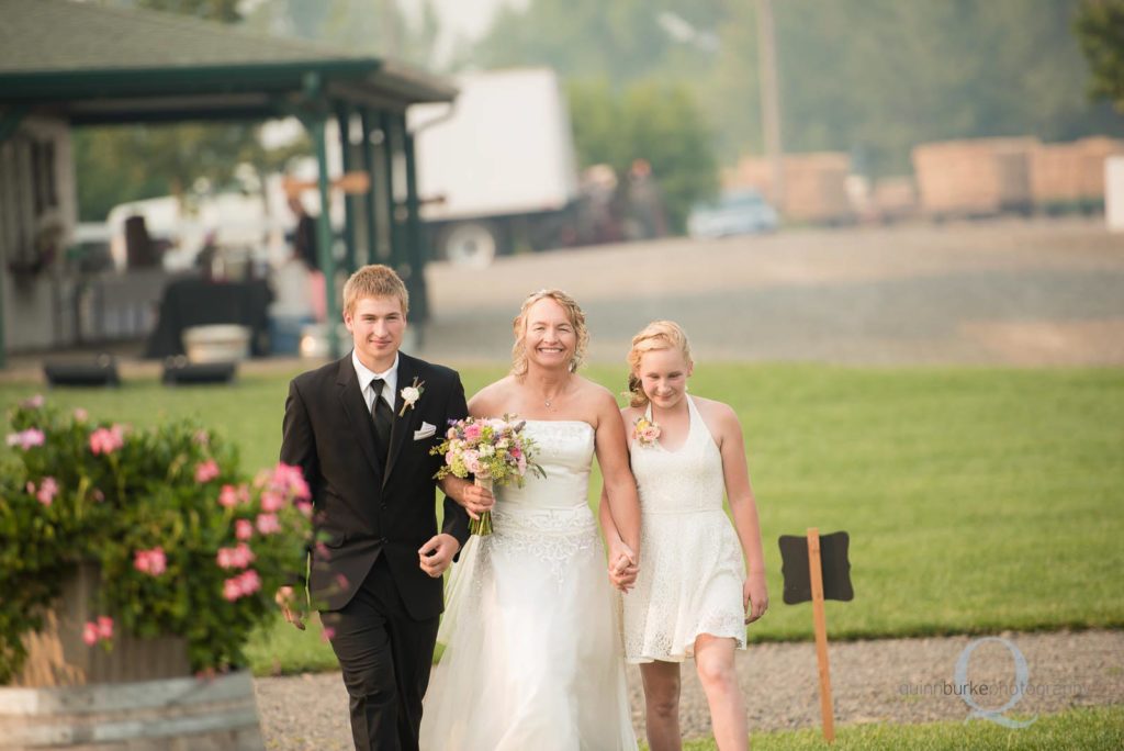 bride and kids walking down aisle