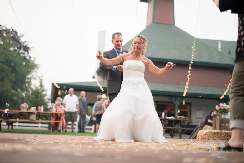 bride and groom dancing