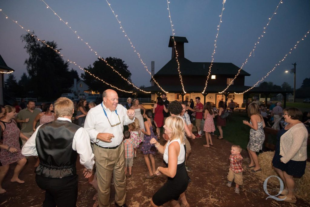 wedding guests dancing at night