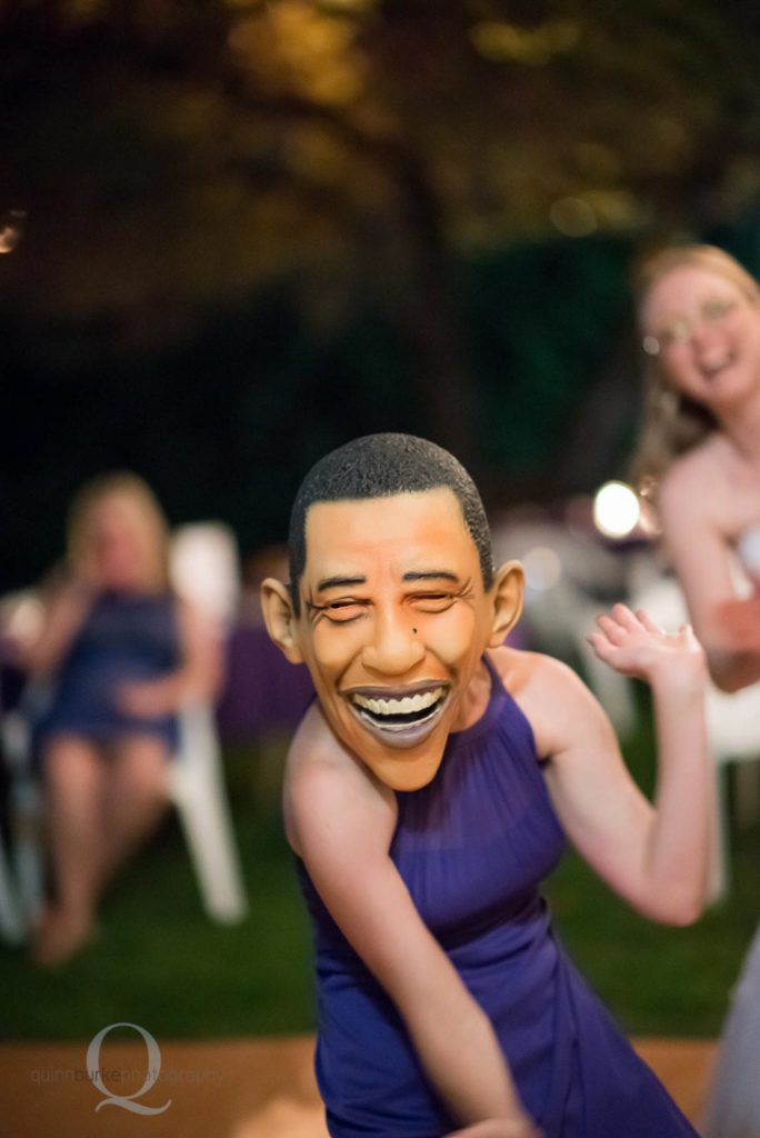 wedding reception girl obama mask dancing