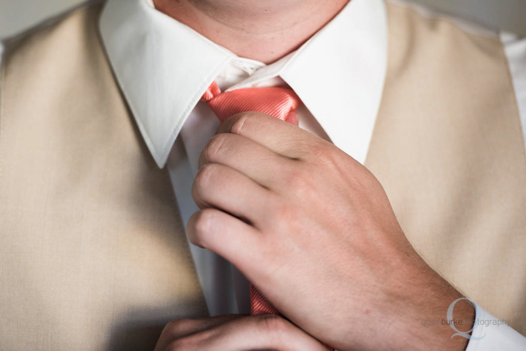 Groom Adjusting Tie