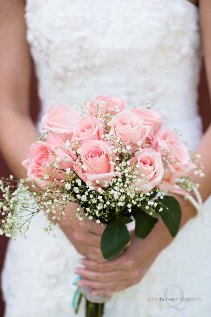 bride holding flowers