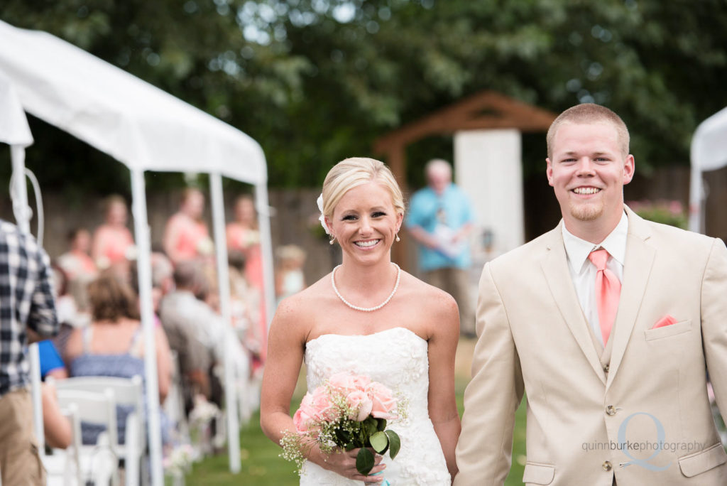 bride groom walking down aisle