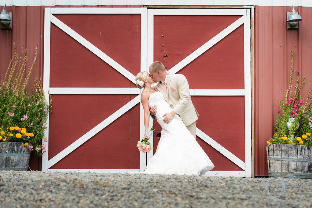 bride and groom barn portrait