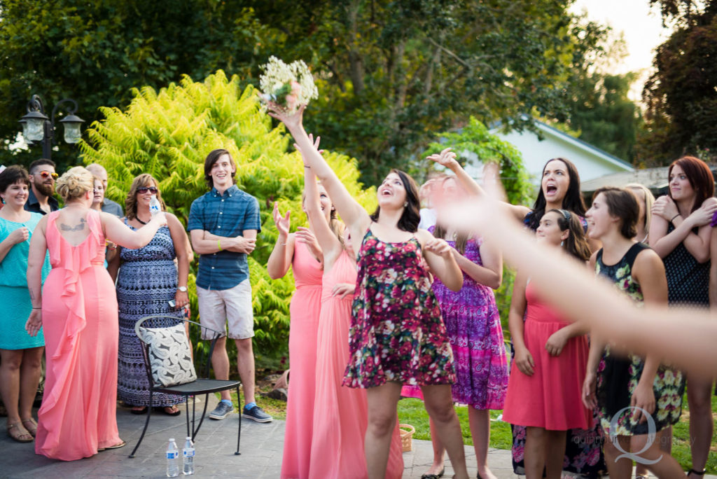 Wedding reception bouquet toss