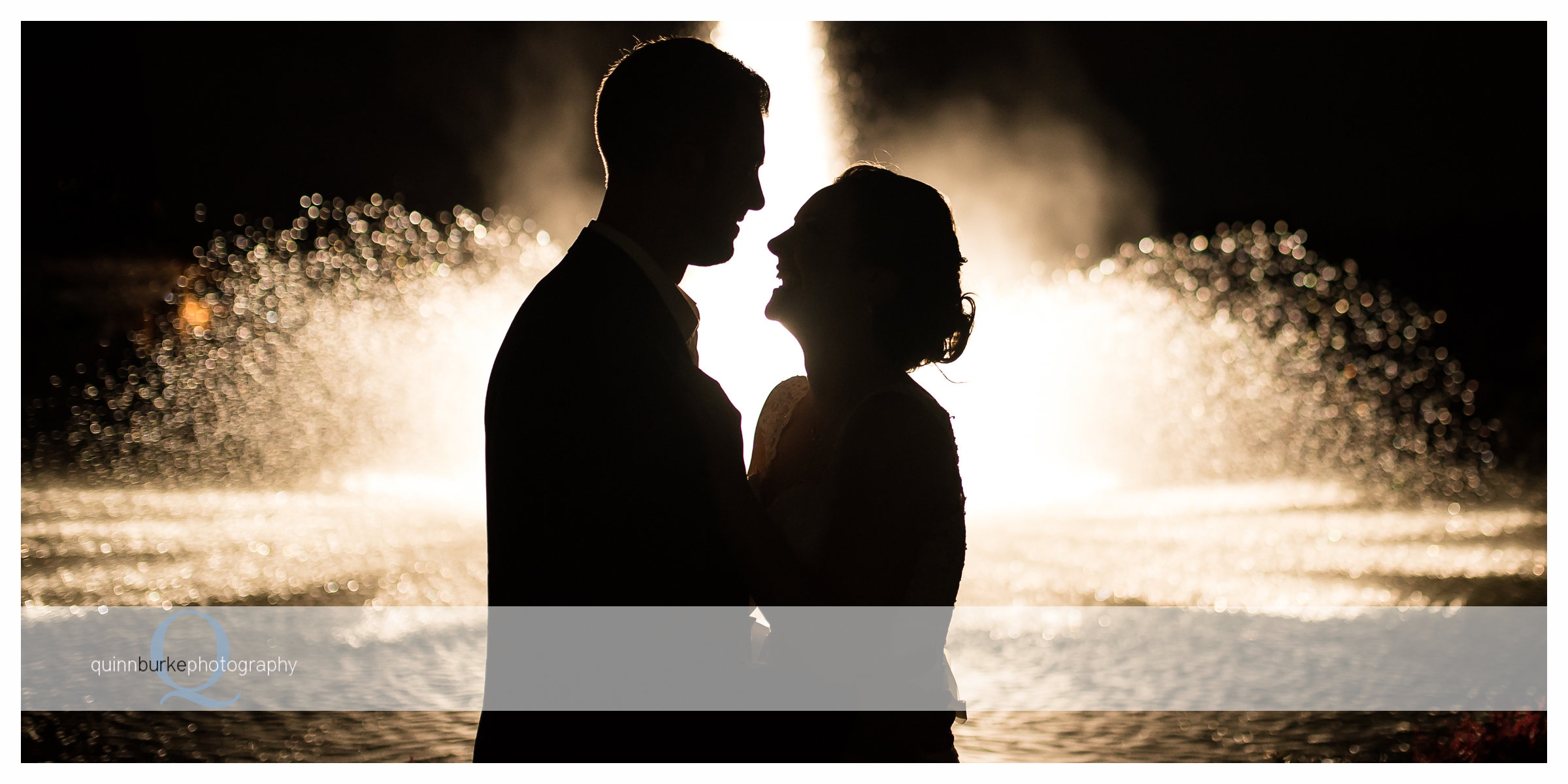 bride and groom in front of zenith vineyard fountain