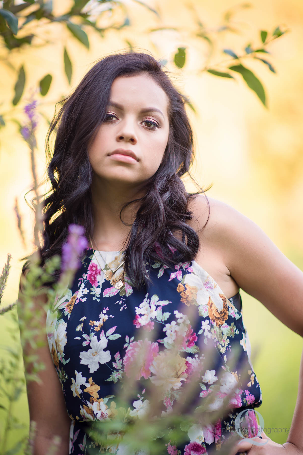 senior photo with golden background