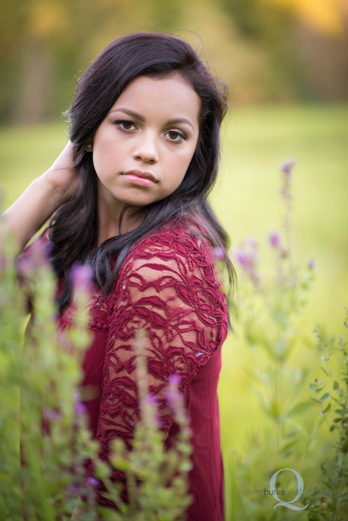 hs senior outside with flowers