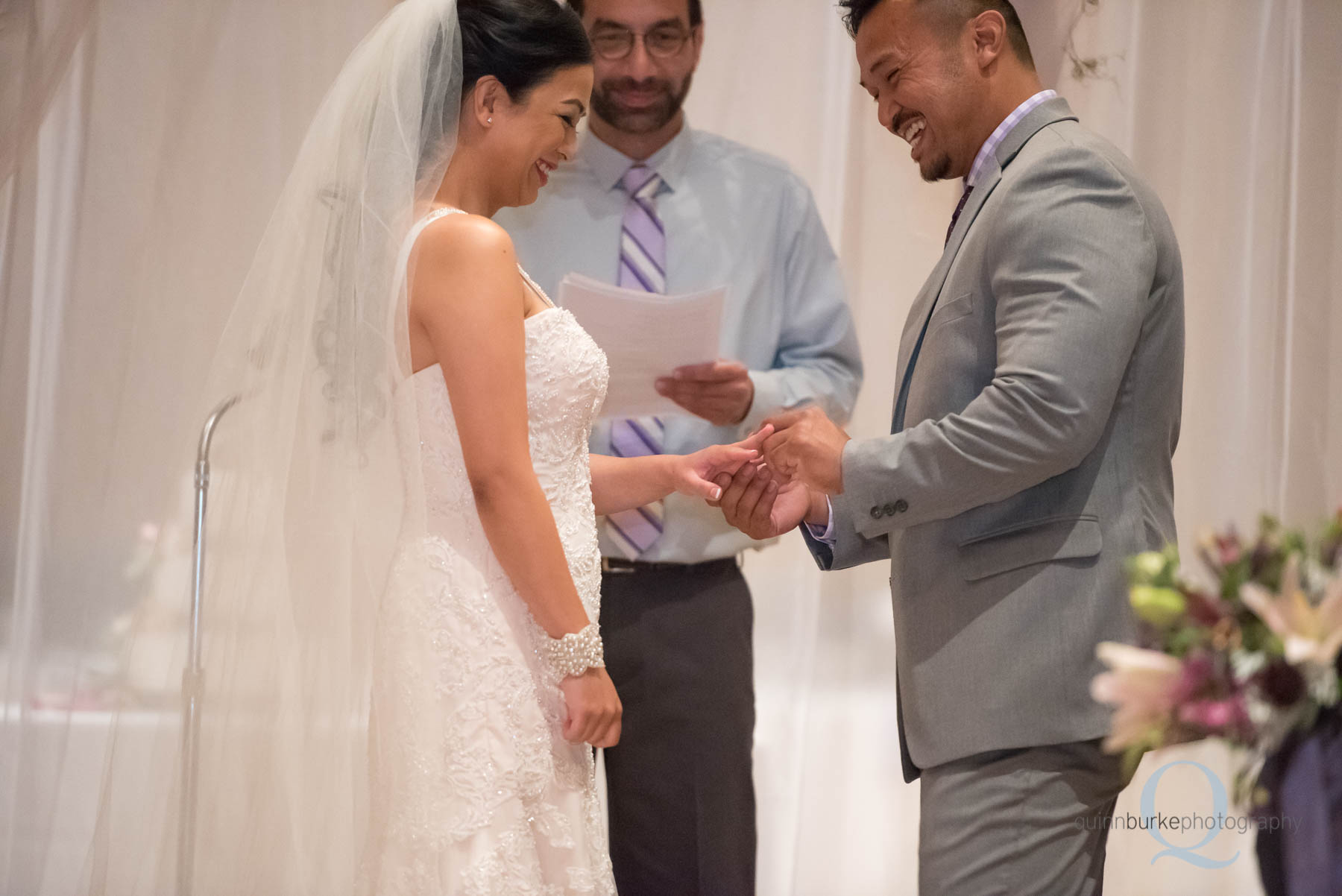 groom placing ring on bride portland wedding