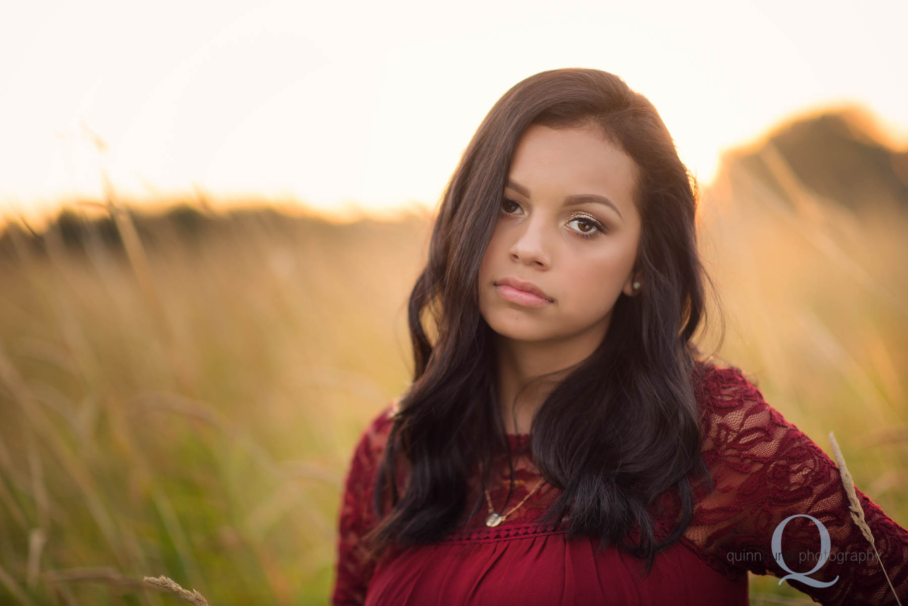 senior in long grass field