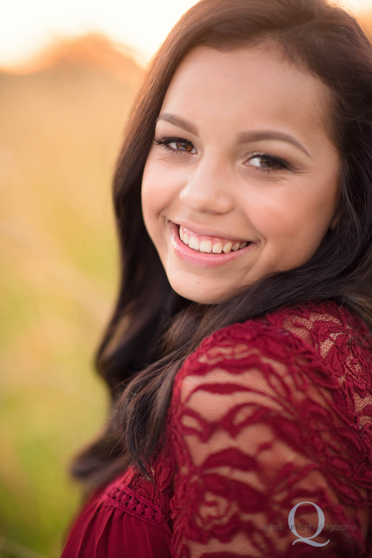 closeup senior hs portrait in field