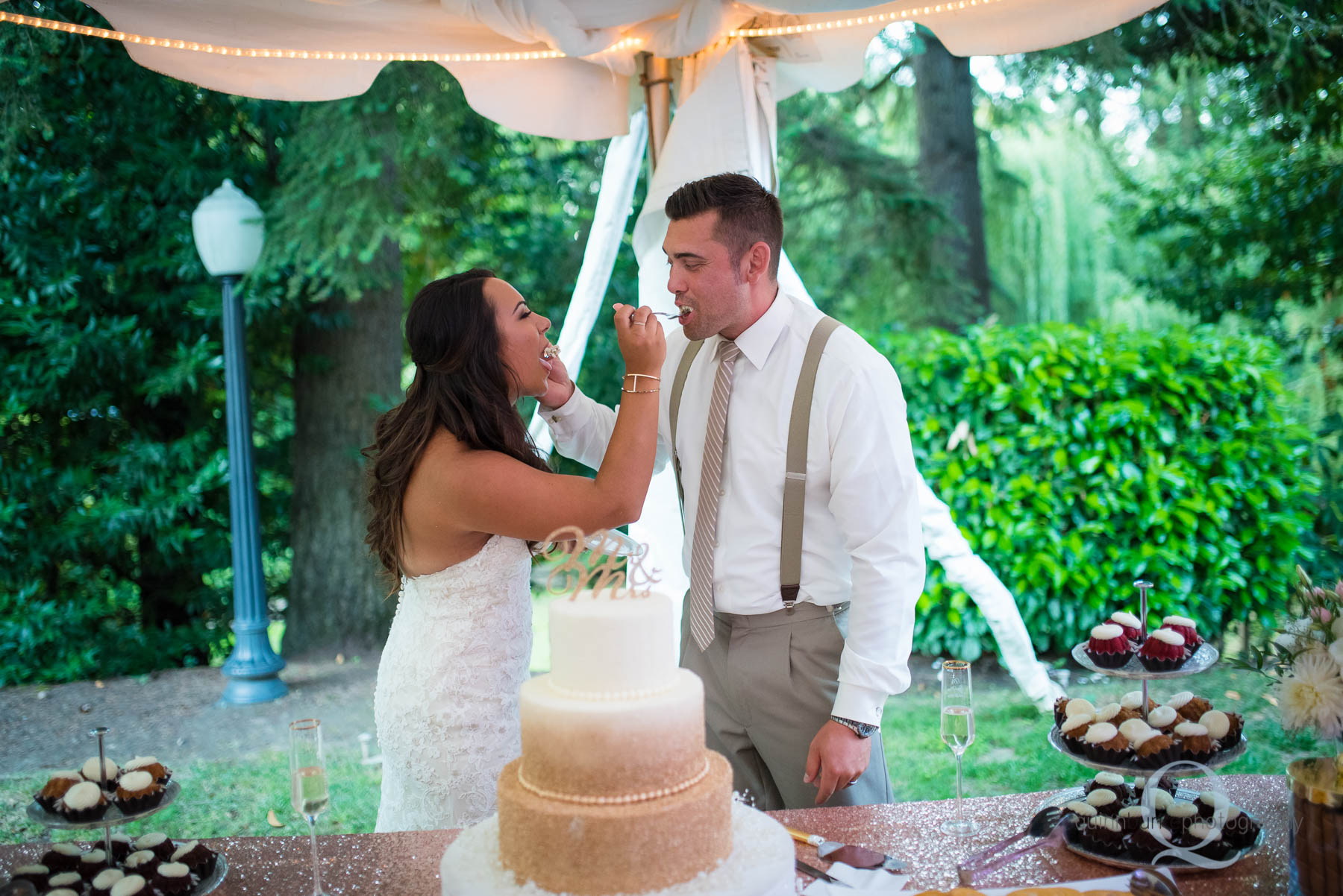 Abernethy Center Portland Wedding bride groom feeding cake