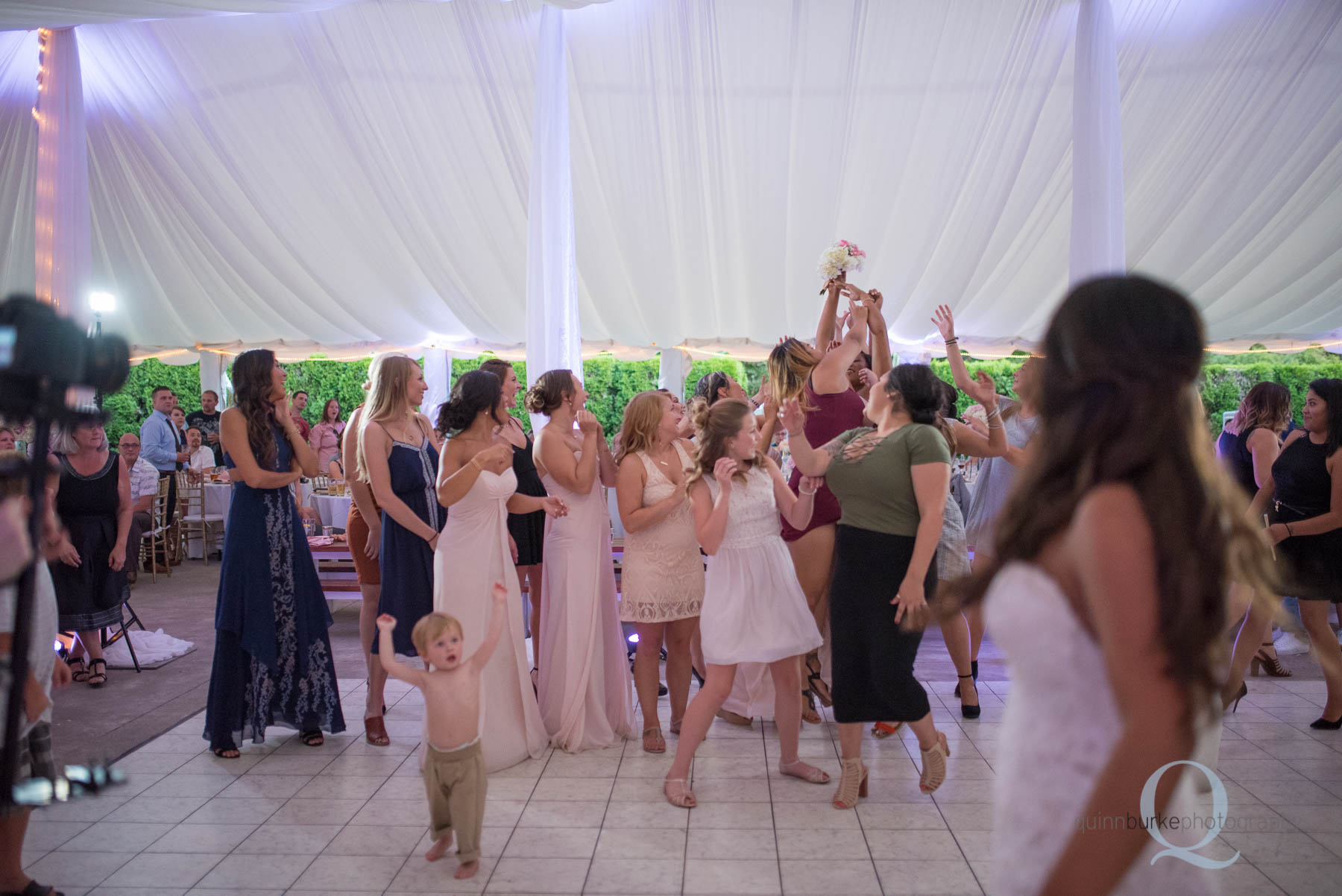 Abernethy Center Portland Wedding tossing bouquet