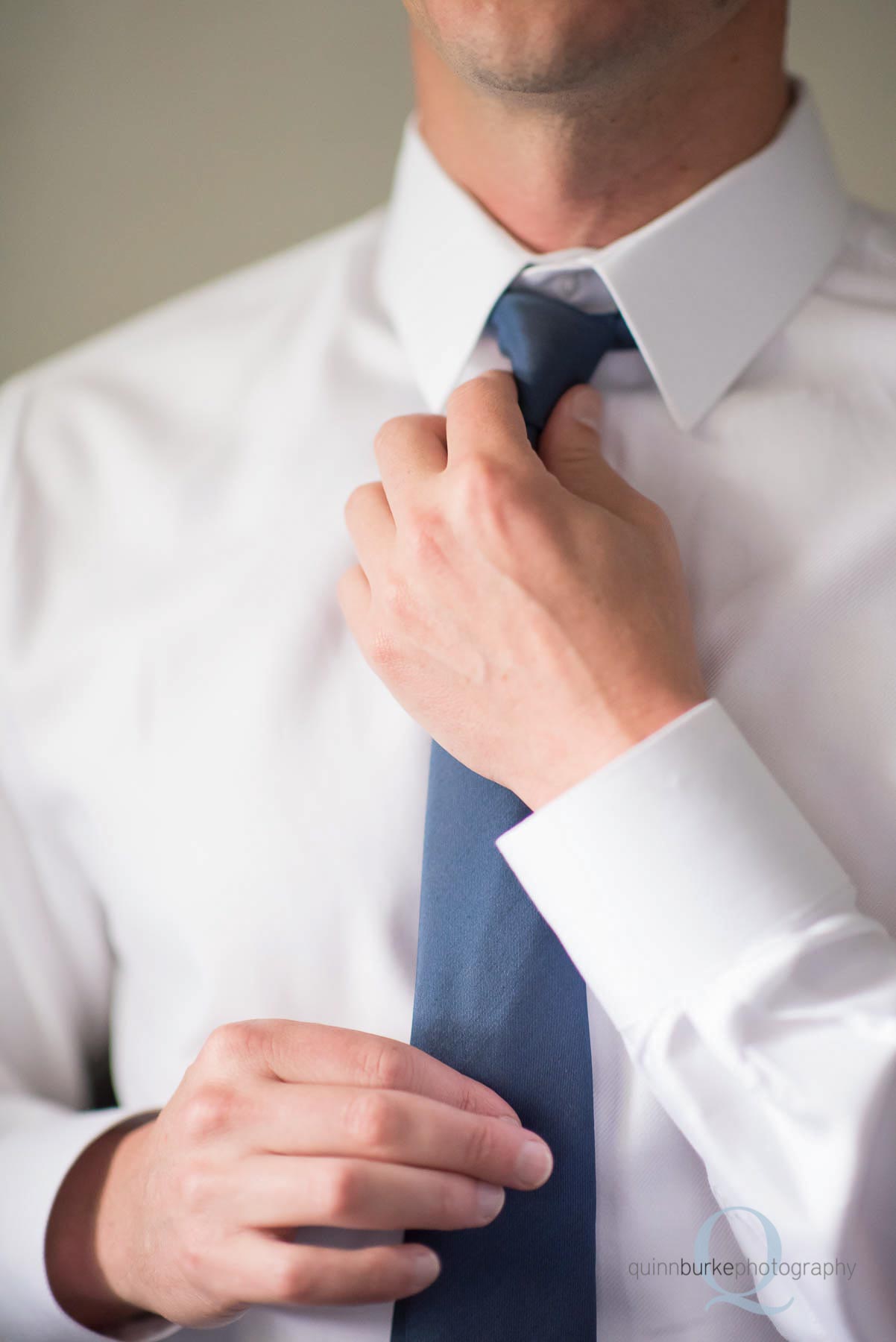 groom straightening tie Old Schoolhouse Newberg wedding