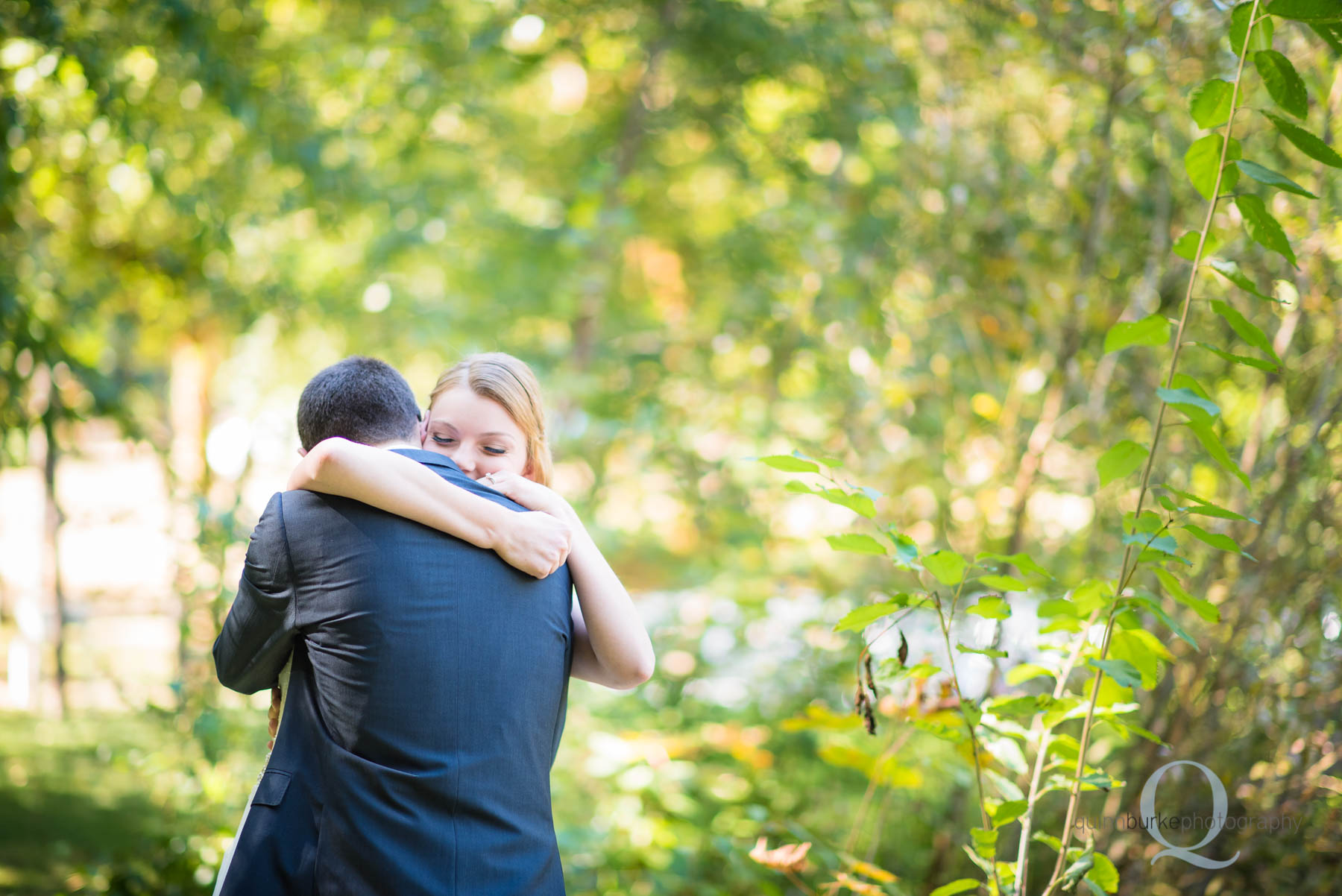 bride groom hug after first look before wedding