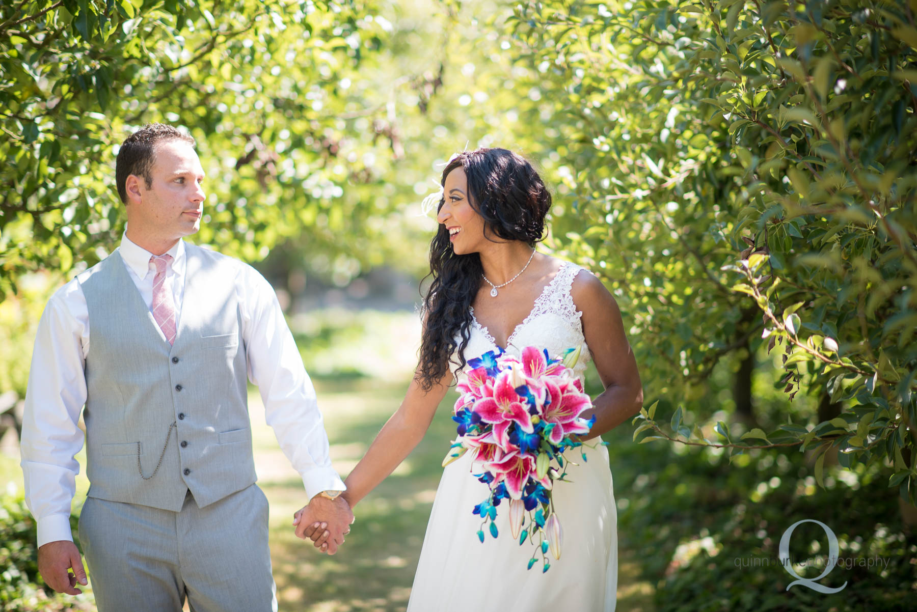 Mcmenamins edgefield bride groom walking in orchard