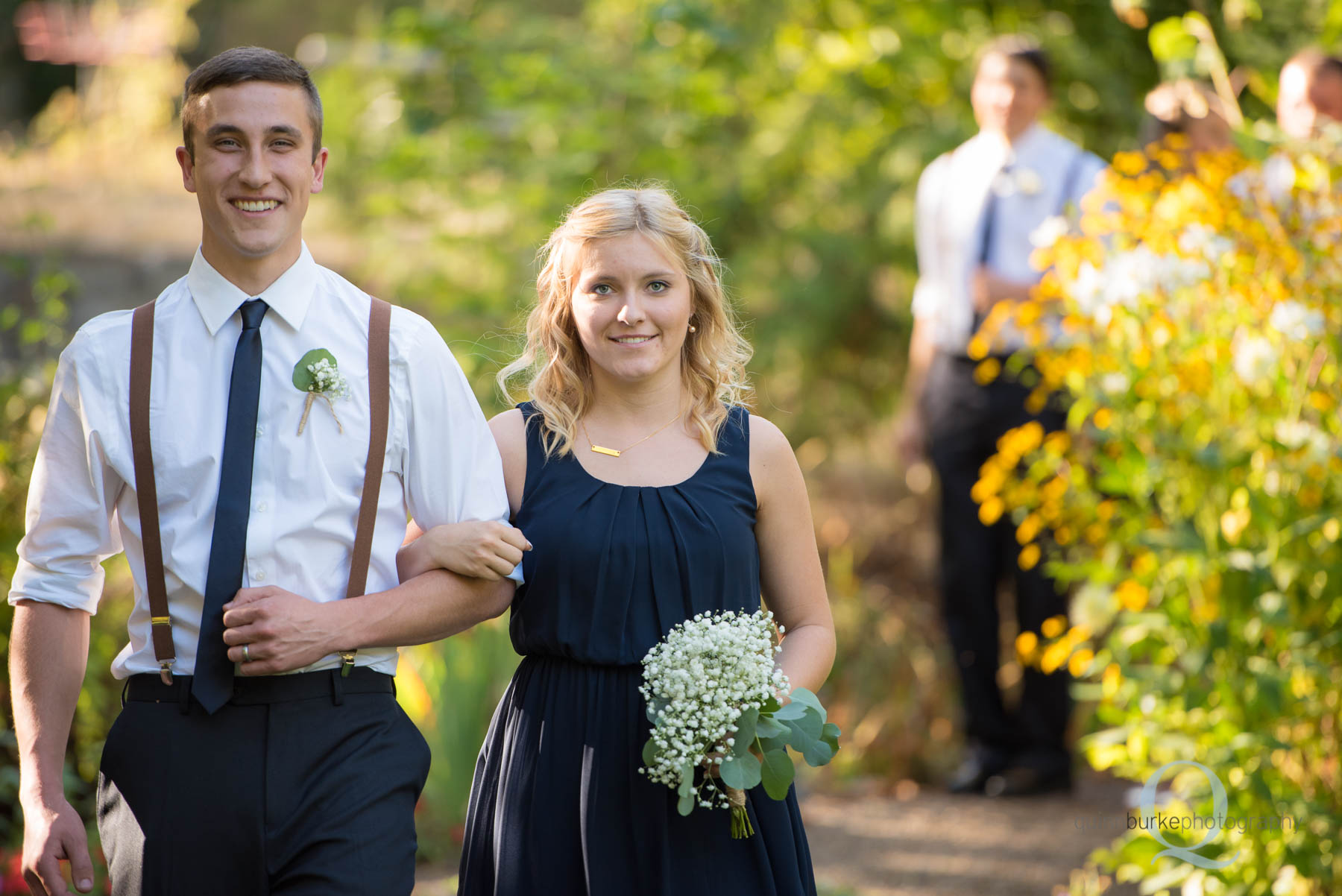 bridesmaid groomsmen walking at rons pond wedding