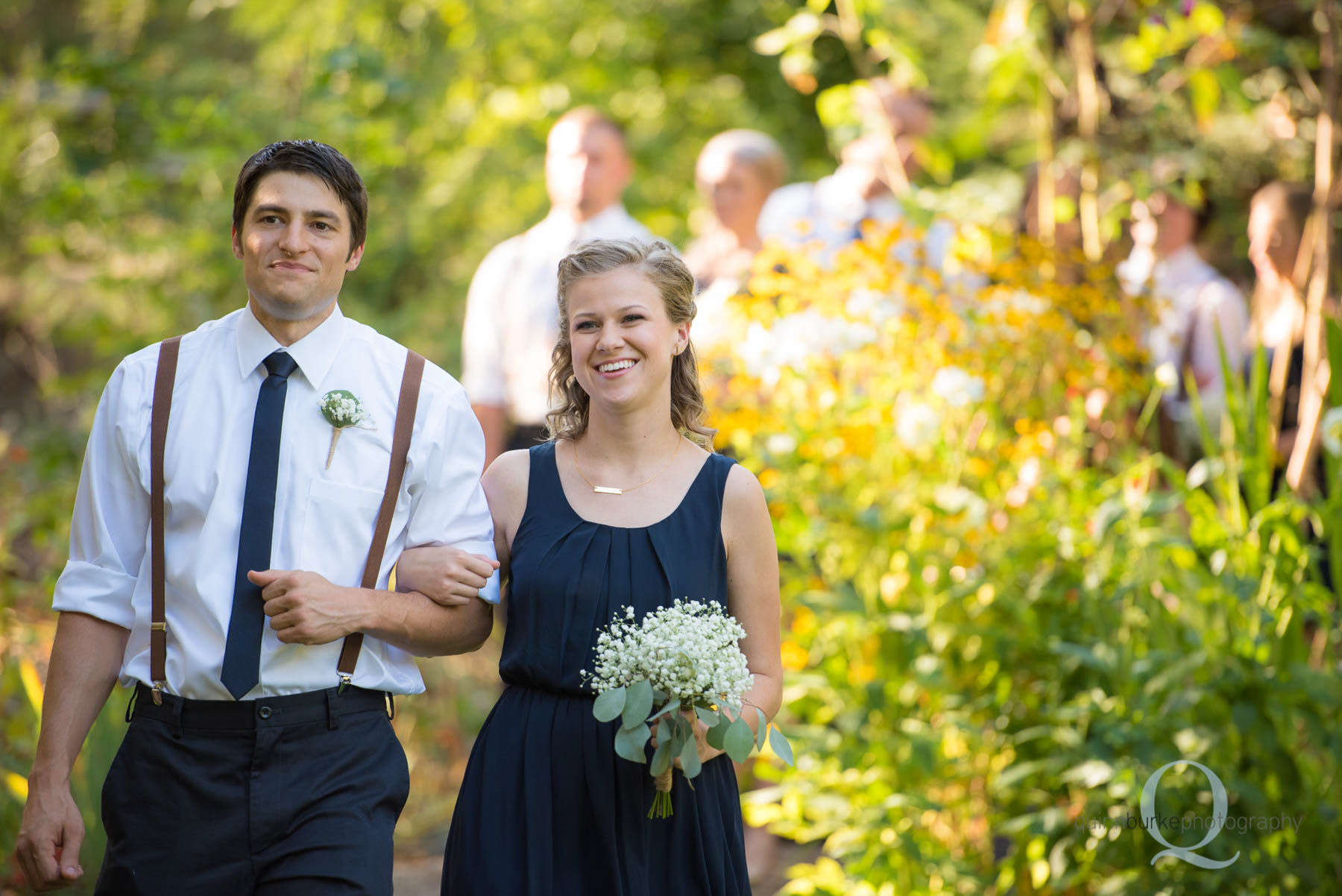 bridesmaid groomsmen walking at rons pond wedding