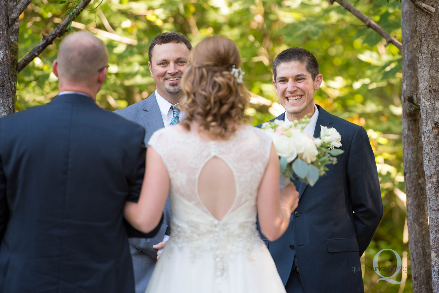 groom seeing bride walk down aisle wedding