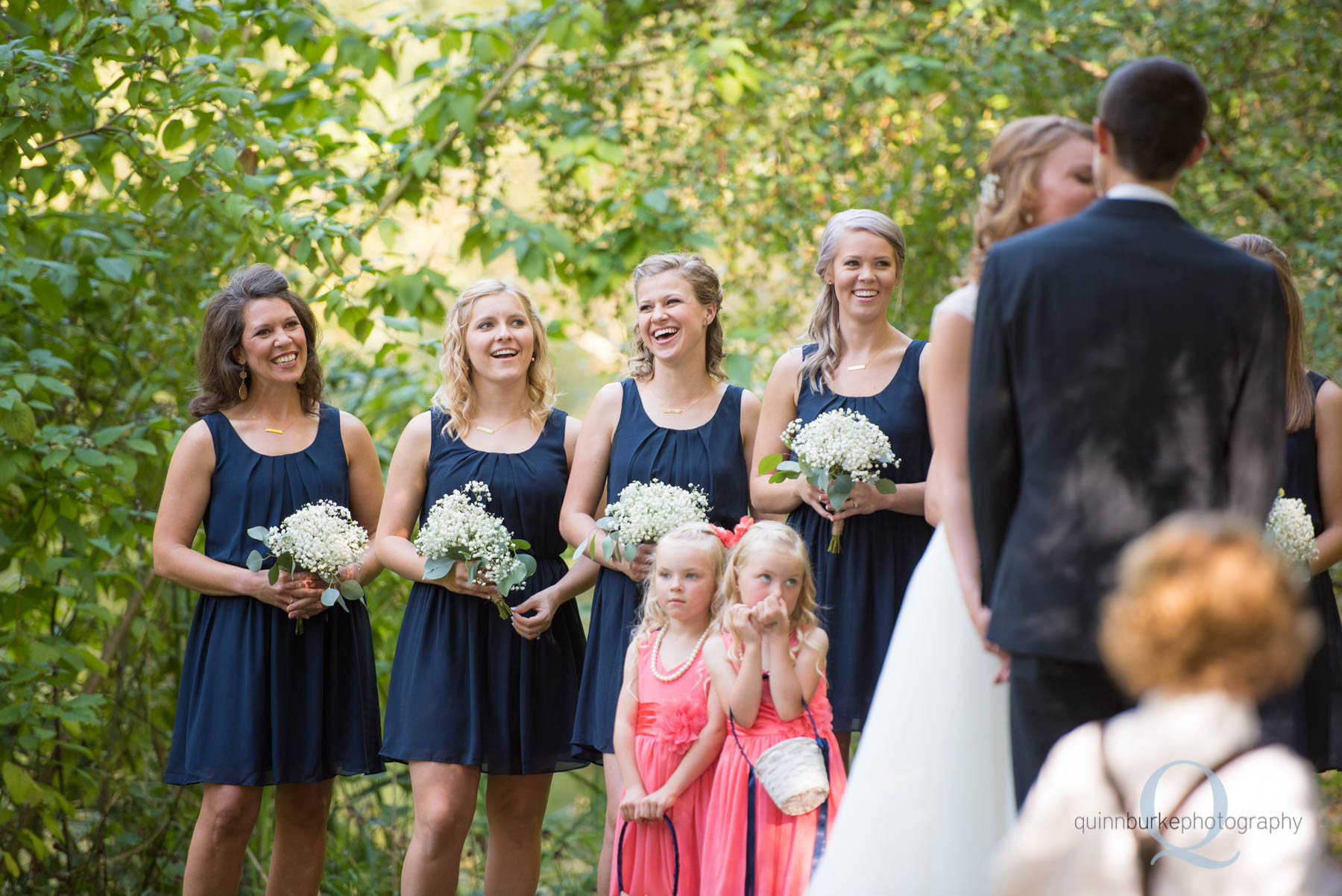 bridesmaid during wedding ceremony at rons pond