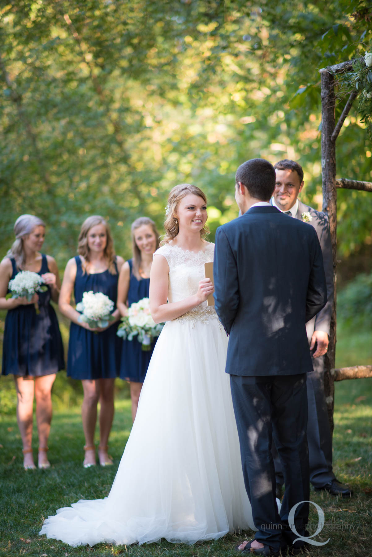 wedding ceremony bride and groom at rons pond