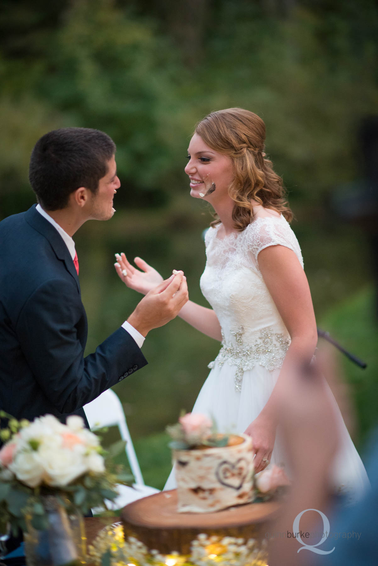 cake on the face during wedding reception at rons pond