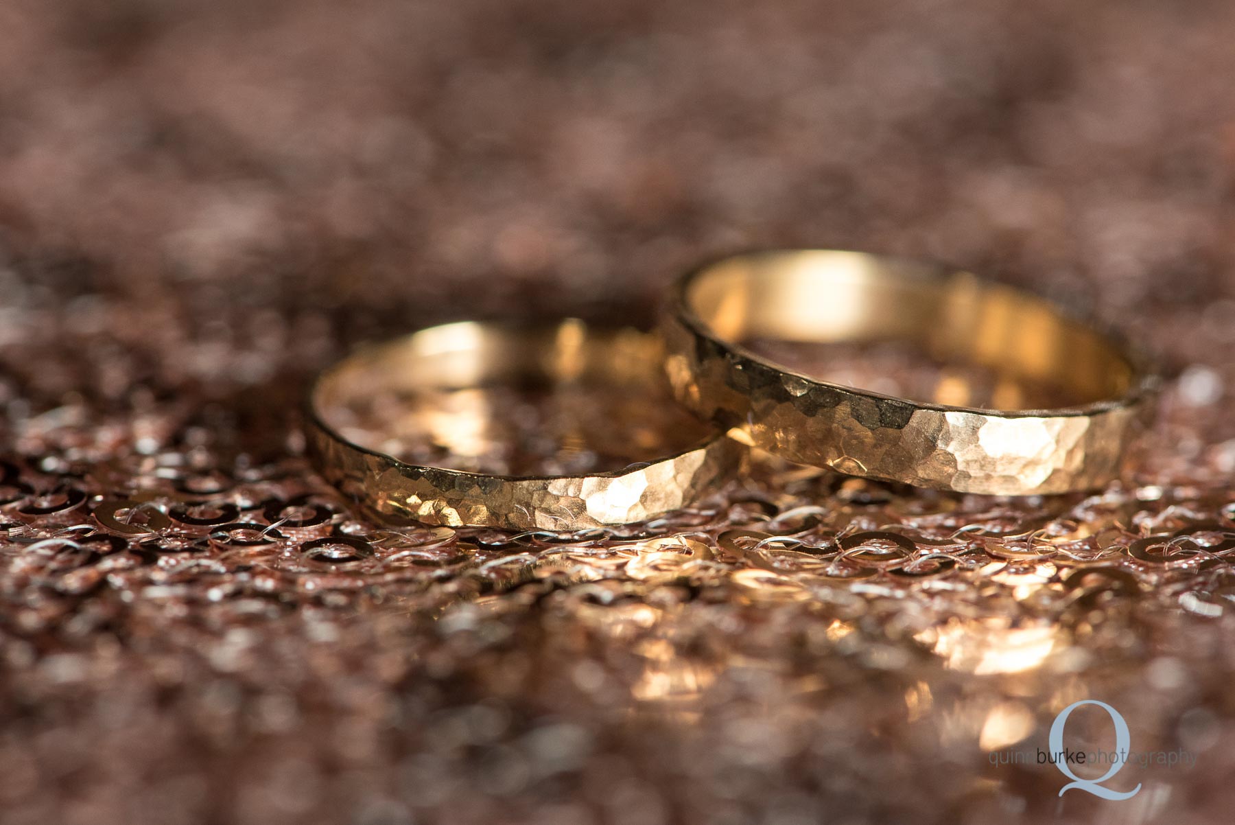 copper wedding rings on sequence cloth at Perryhill Farm