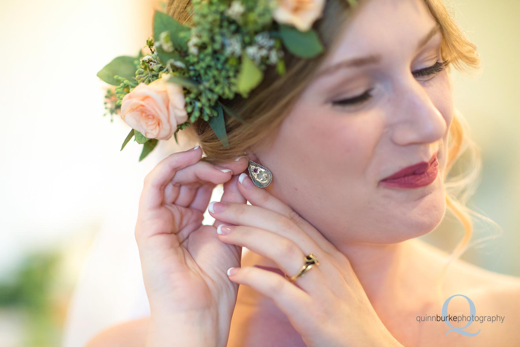 bride putting in earrings at Perryhill Farm