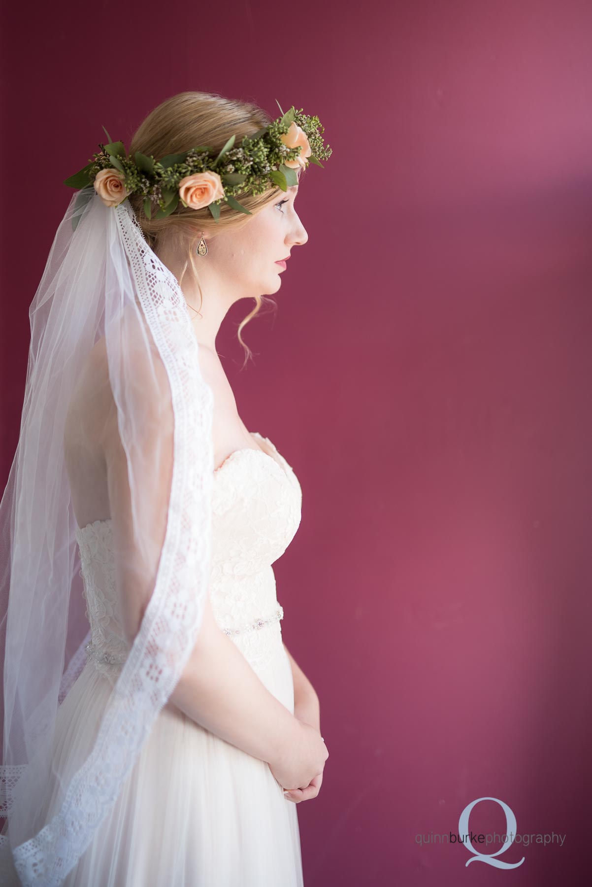 bridal portrait in front of magenta wall wedding