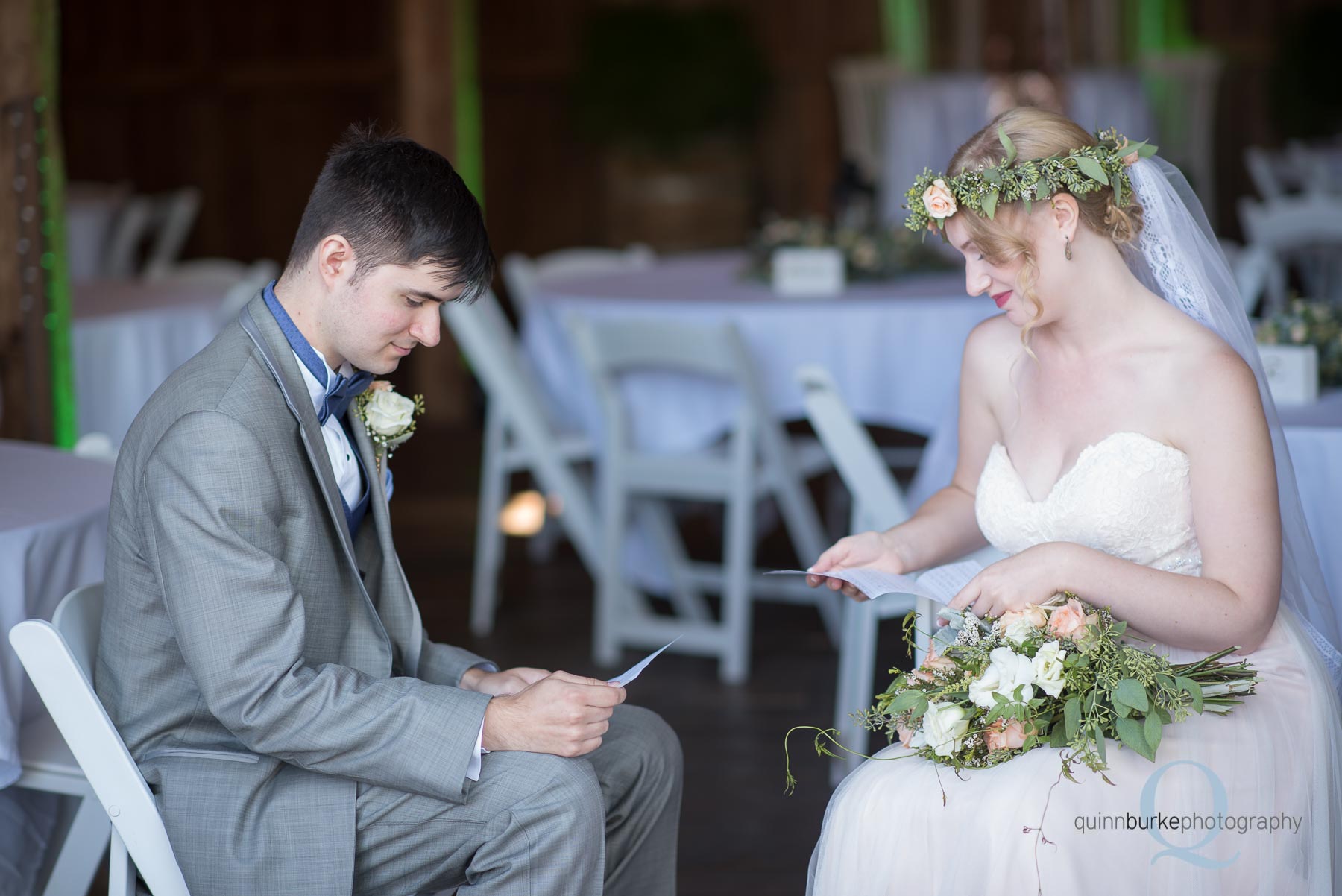 bride and groom reading notes from each other before wedding Perryhill Farm