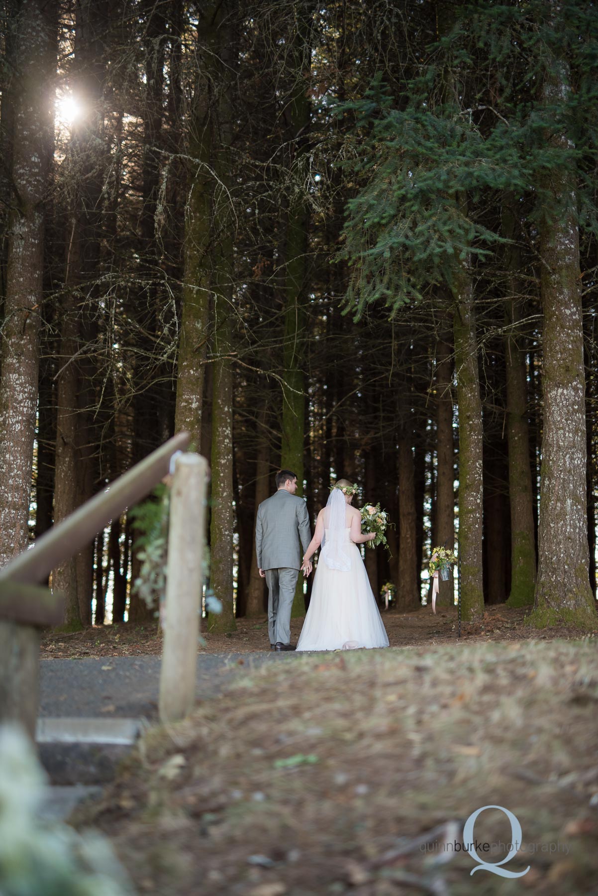 bride and groom walk away from ceremony Perryhill Farm wedding