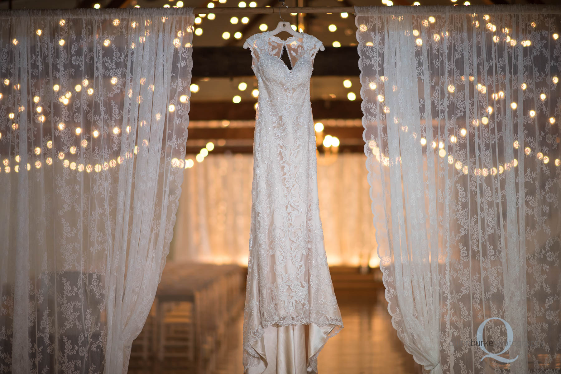 wedding dress hanging at Green Villa Barn