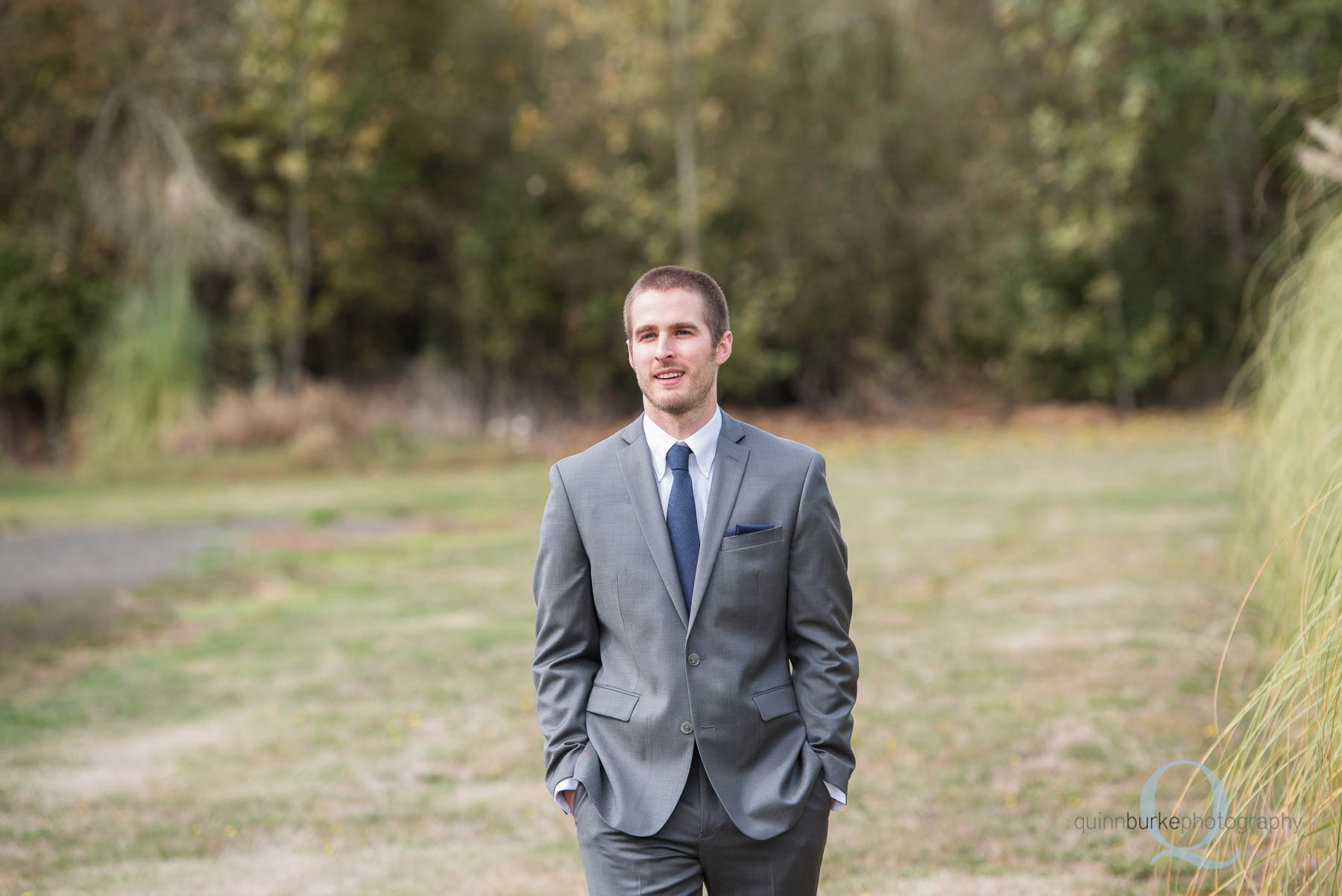 groom walking at Green Villa Barn