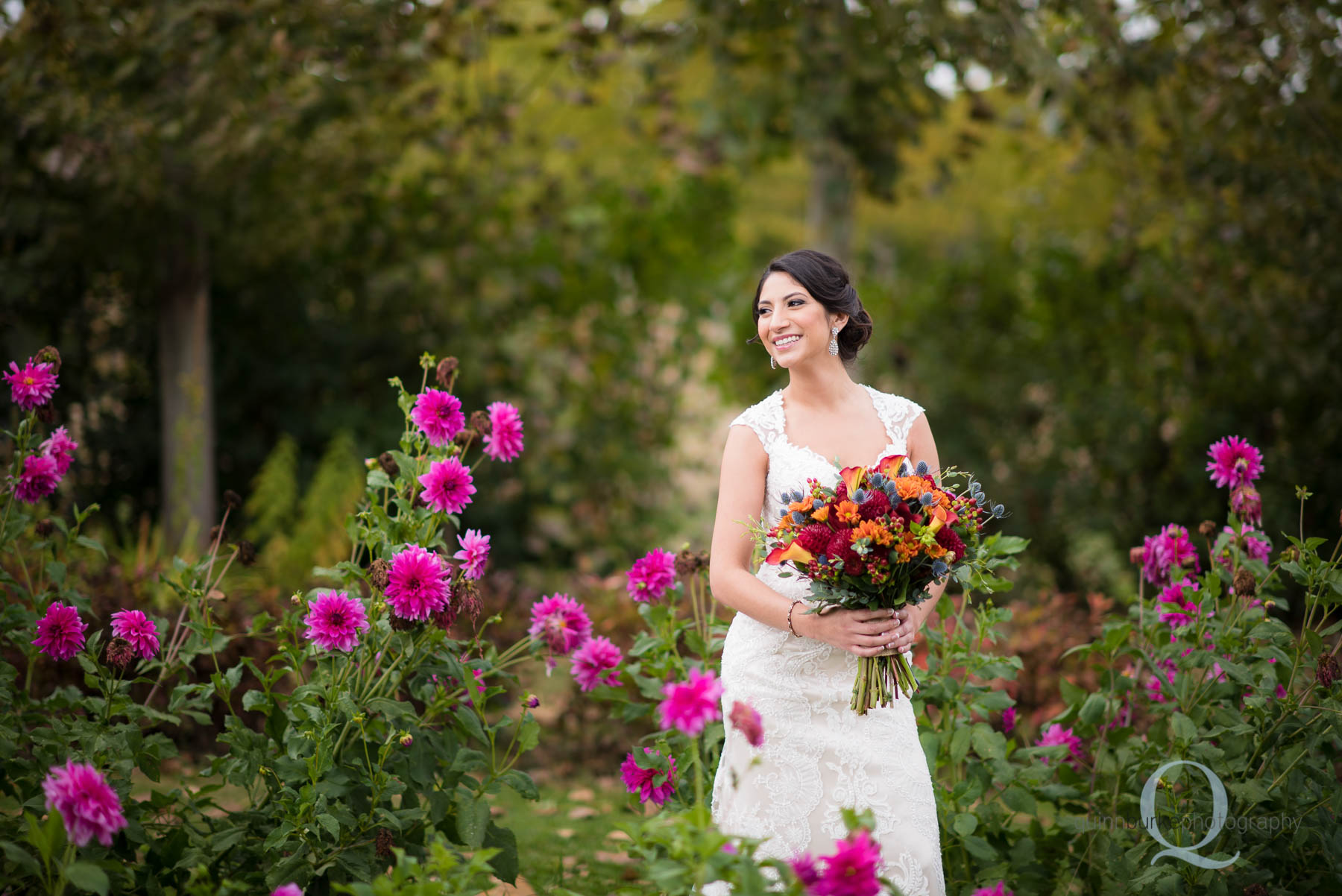 bride in flower garden at Green Villa Barn wedding