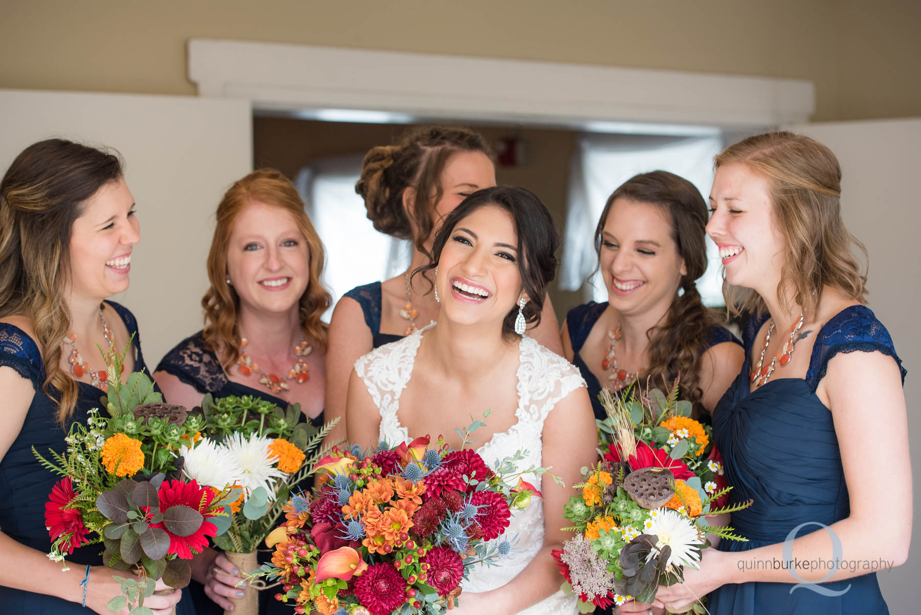 bridal party at entrance of Green Villa Barn