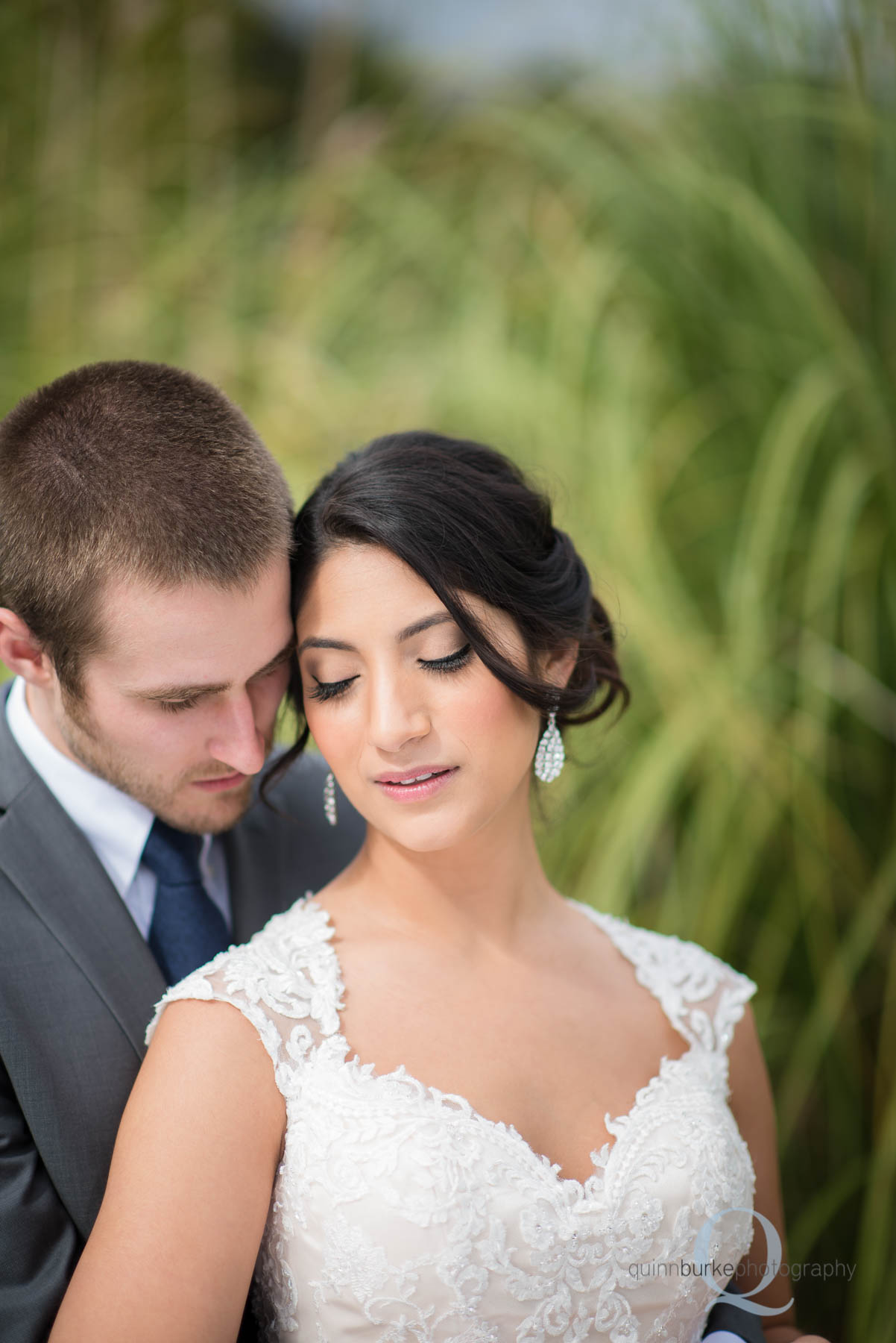 bride and groom outside Green Villa Barn wedding