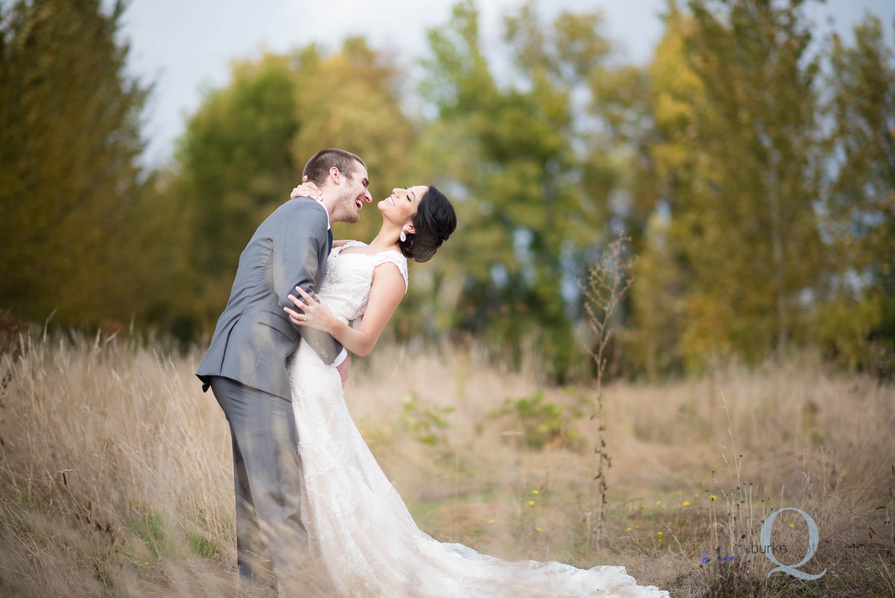 bride and groom laughing at Green Villa Barn wedding