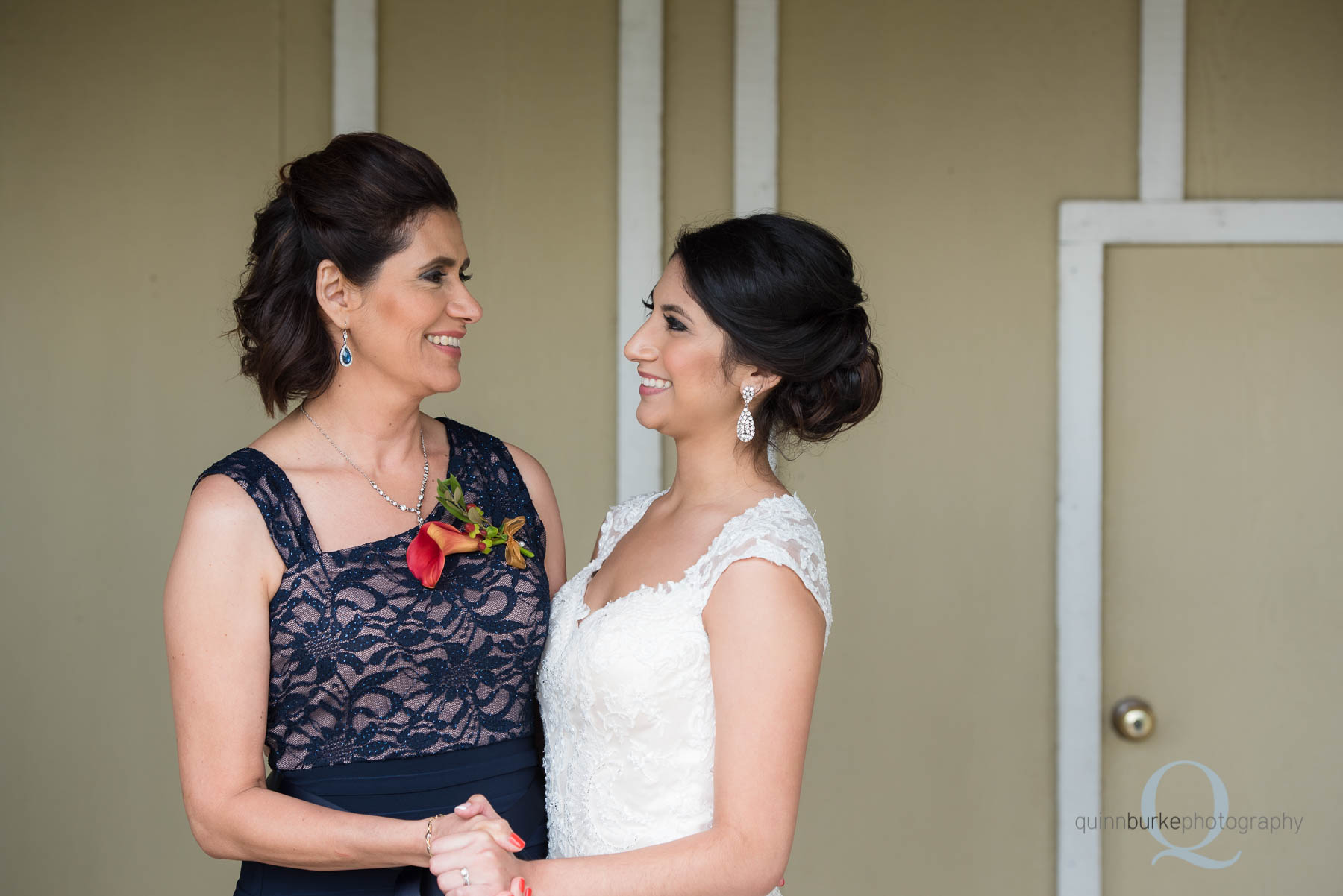 bride and mom at Green Villa Barn before wedding