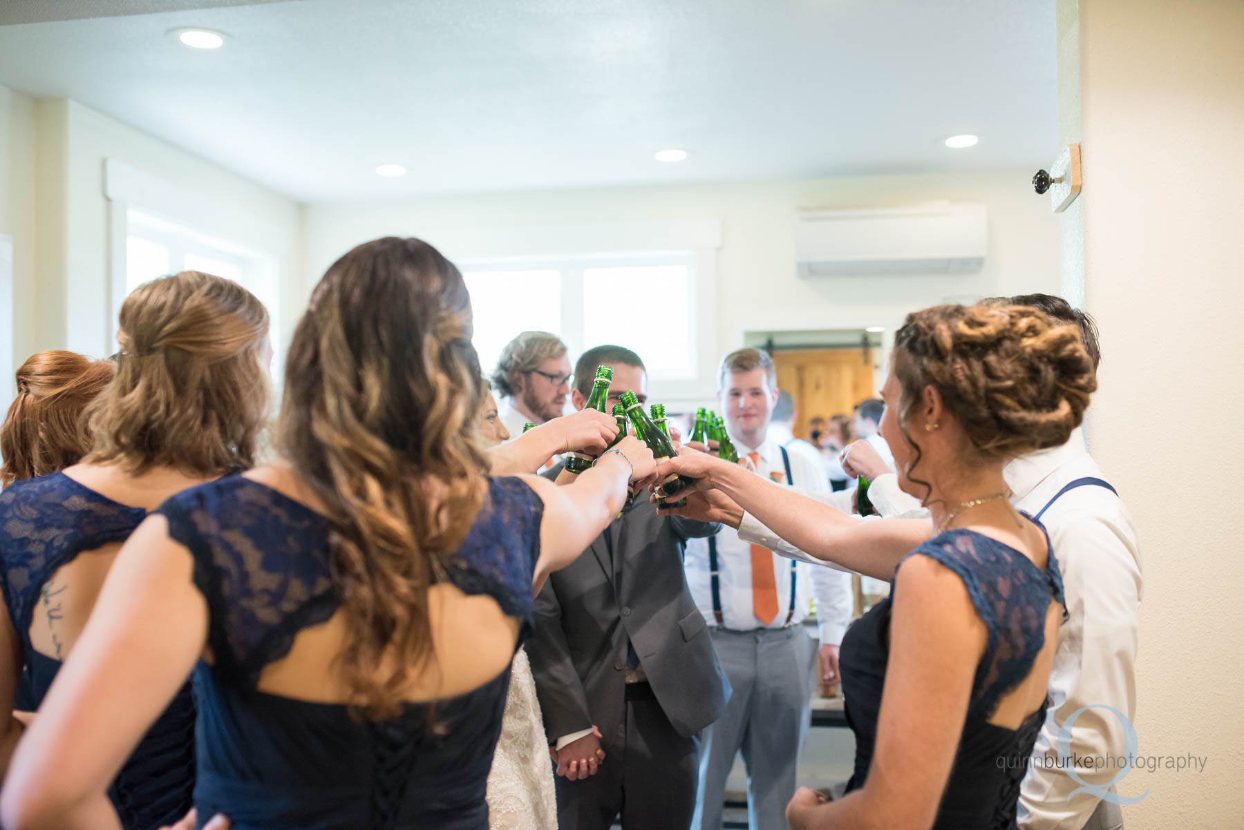 wedding party toasting together before wedding