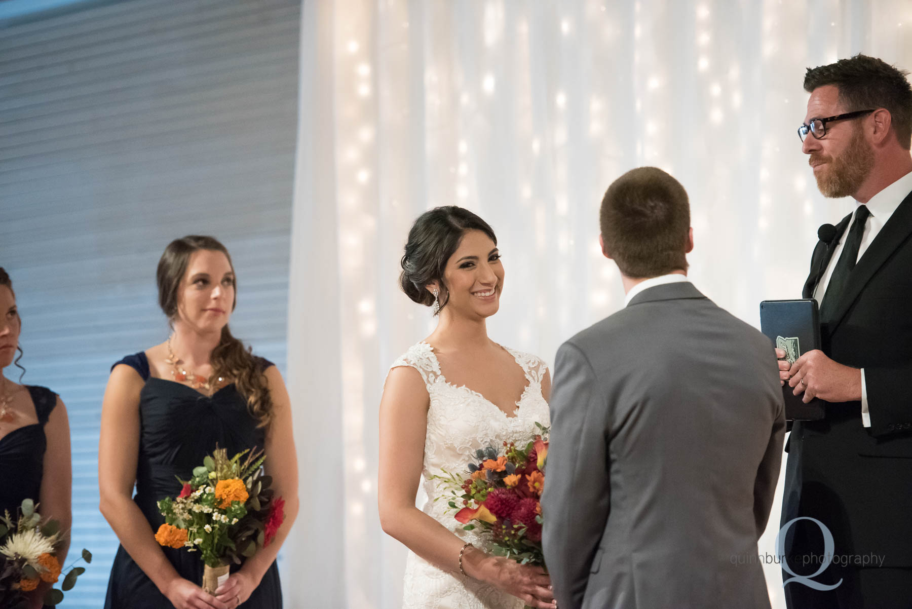 bride during wedding ceremony Green Villa Barn