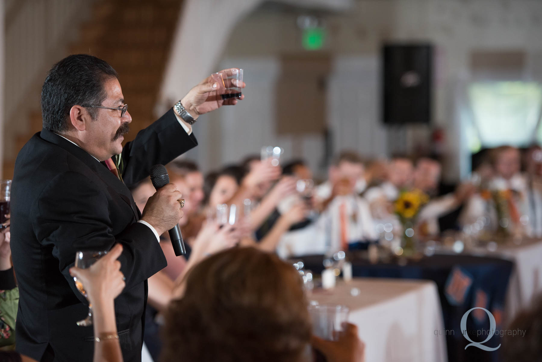 dad toasts at wedding ceremony Green Villa Barn