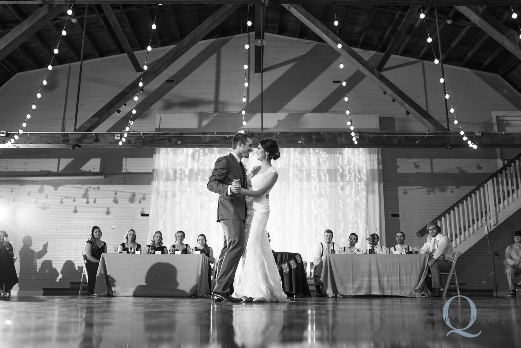 bride and groom first dance in barn at Green Villa Barn wedding