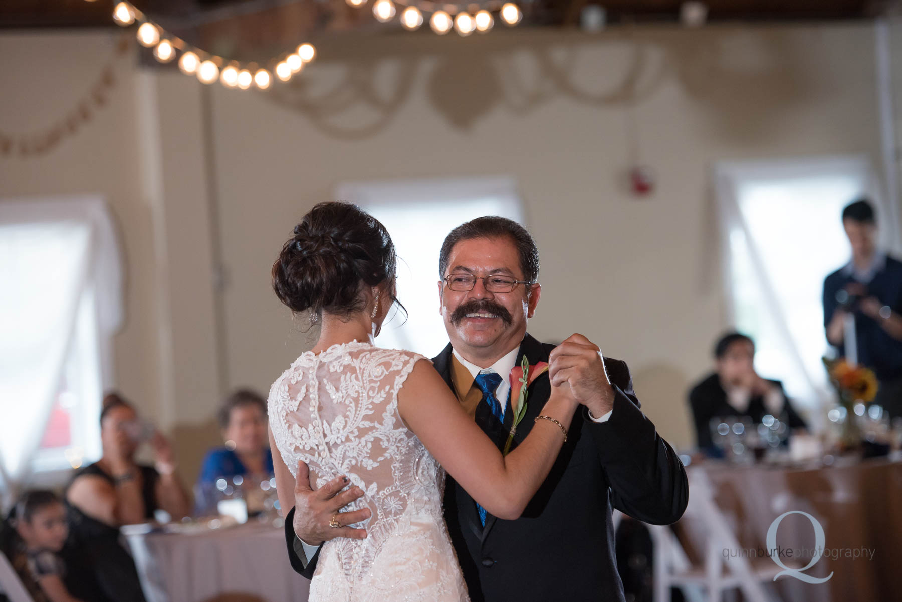 dad dancing with bride daughter during reception at Green Villa Barn