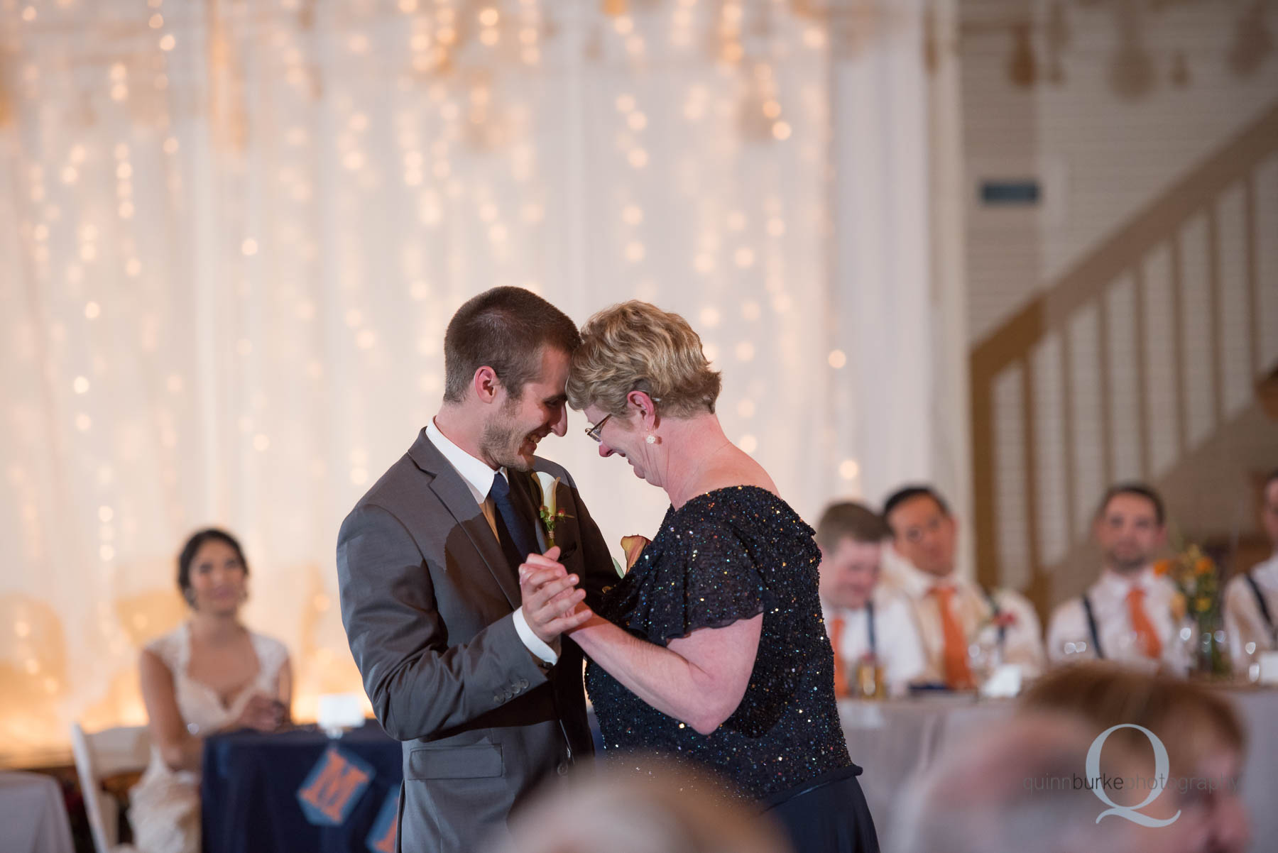 mother son groom dance during reception Green Villa Barn wedding